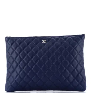 Chanel O Case Clutch Quilted Caviar