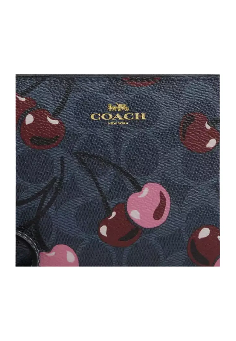 Coach Corner Zip Wristlet In Signature Canvas with Cherry Print In Denim CZ450